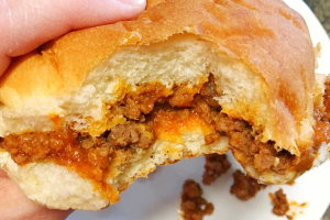 Sloppy Joe on a bun with a bite out of it