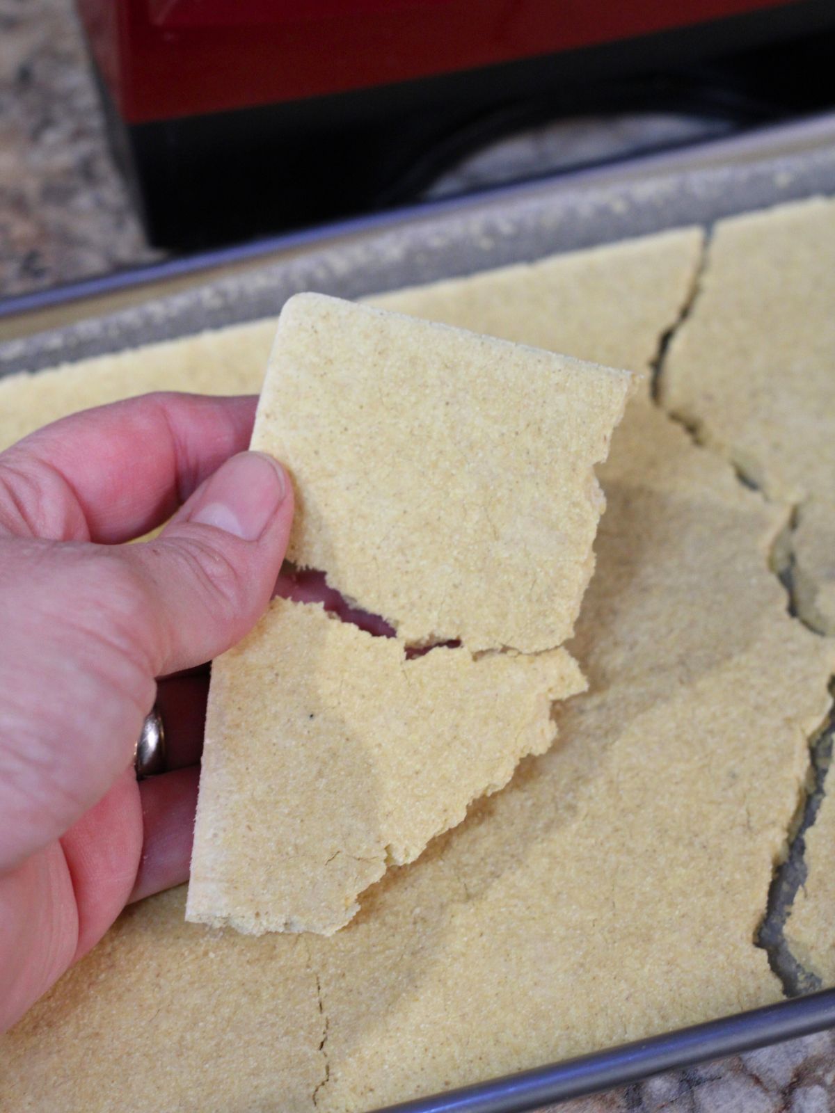 Broken freeze dried pancake batter on a tray